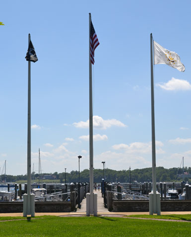 Flags overlooking Bristol Harbor at Firefighters Memorial Park, Thames St., Bristol, R.I.
