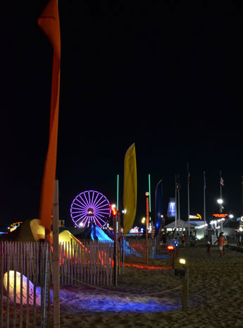 Nighttime view of Sandfest 2016 and the ferris wheel, Ocean City, Md.