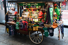 Boston Logos, pushcart in the Quincy Market North Canopy, Faneuil Hall Marketplace, Boston, Ma.