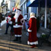 Santa and Mrs. Claus greeting visitors outside Mud Puddle Toys, Pleasant St., Marblehead, Mass.