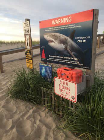 Shark warning sign and first aid kit, Nauset Town Beach, Orleans, Cape Cod