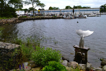 Harborfont view and whale's tail sculpture, Numbanda by artist Ken MacDonald, seen on tour, Wickford Village, R.I.