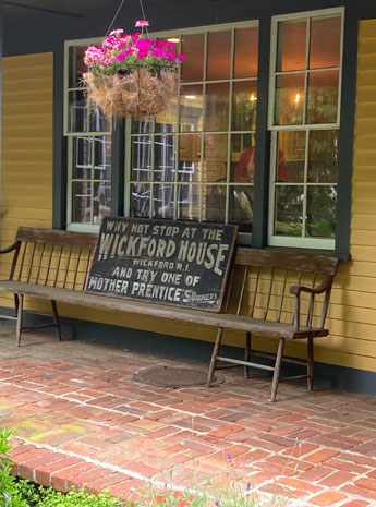 Courtyard at the Wickford House displaying  Mother Prentice sign